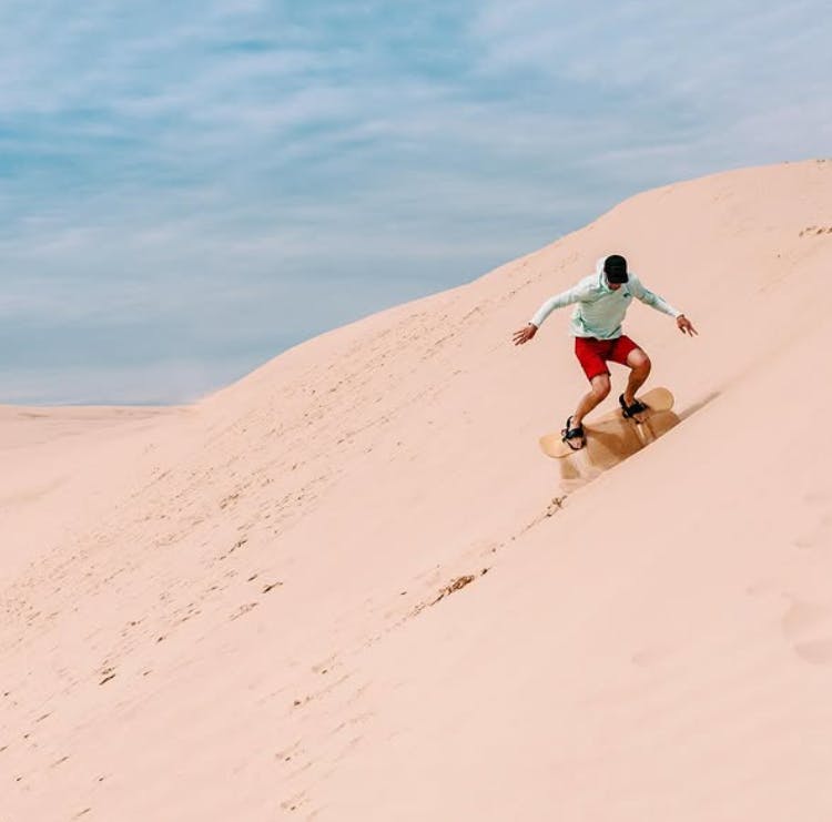 Sandboarding in the Desert